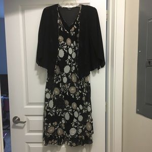 An ANNA dress with light jacket